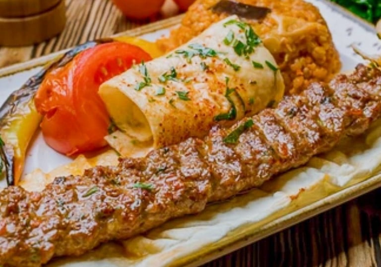 a plate of food with meat and vegetables