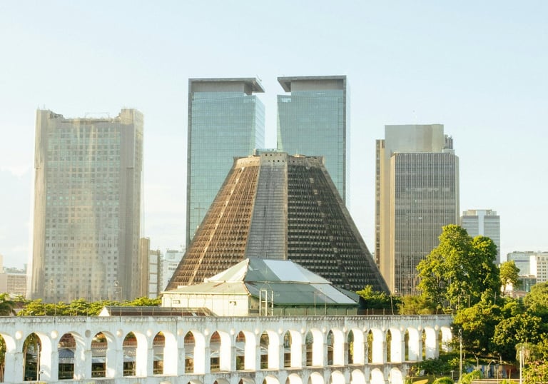 a large building with a clock tower in the background, Rio de Janeiro, Brazil