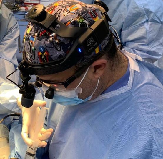 Photograph of Dr. Manuel M. Rodriguez-Reyes Performing Maxillofacial Surgery in Cape Coral, Florida
