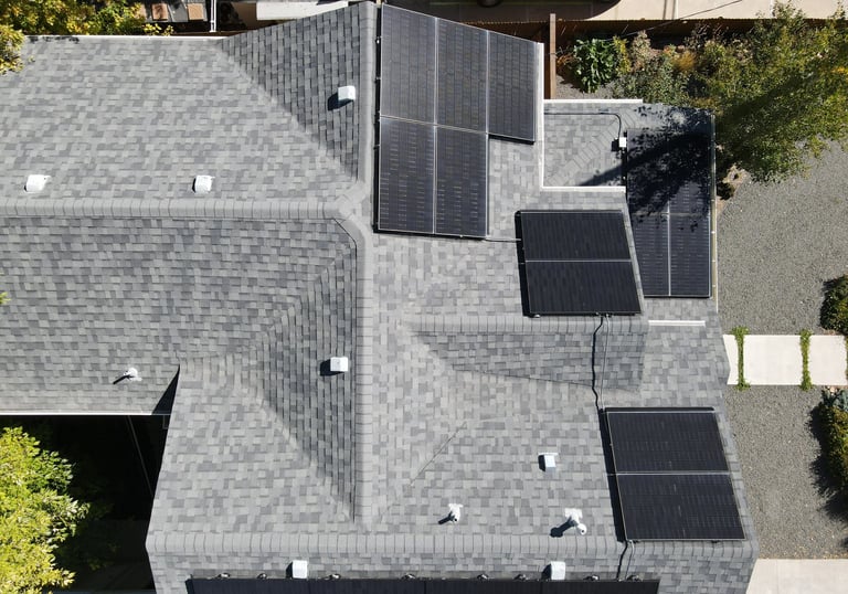 Image of a roof in Golden, CO, with solar panels.