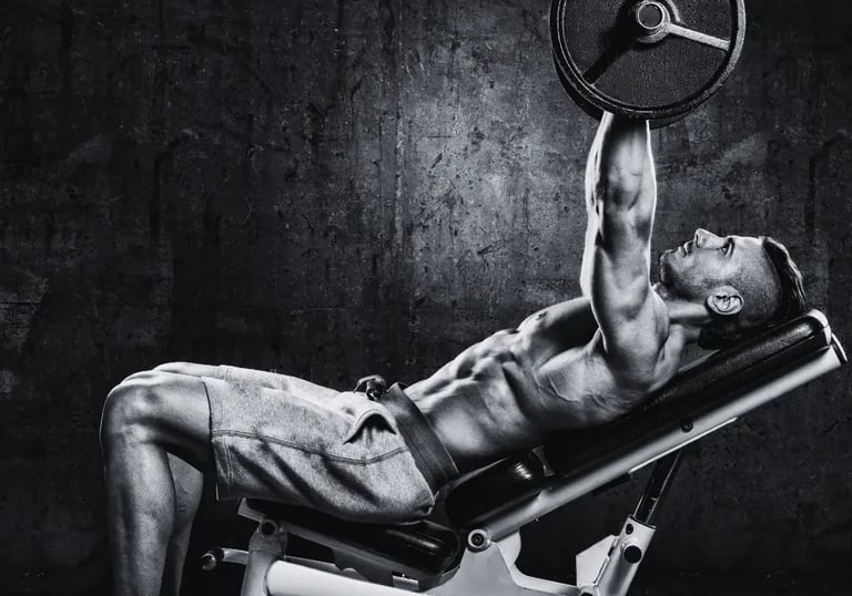 a man doing a incline bench press in a gym