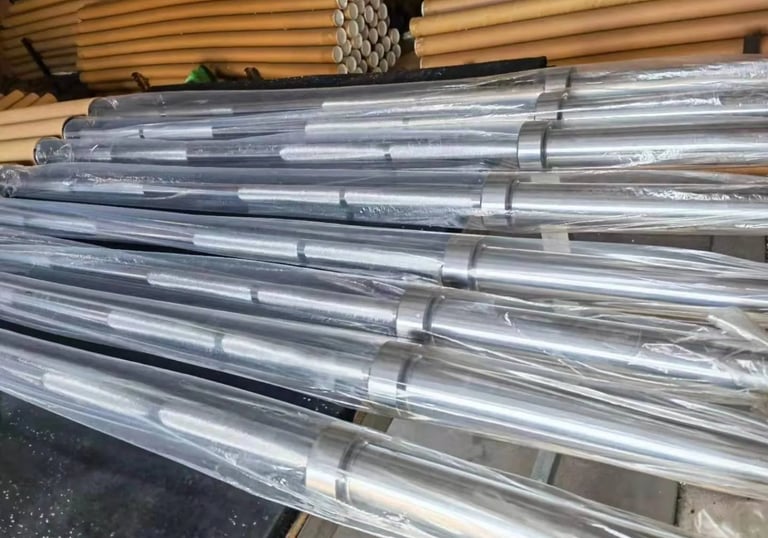 Finished barbells packaged for bulk shipment and wholesale distribution