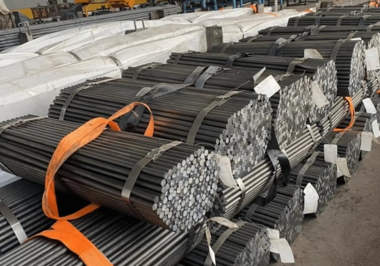 Raw steel materials prepared for barbell manufacturing