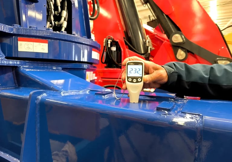 At our facility, we inspect blue paint thickness on a 5T truck mounted crane (crane truck) for durability & appearance.