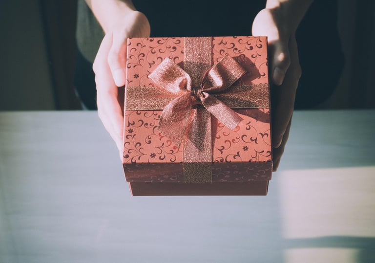 Handing a gift box