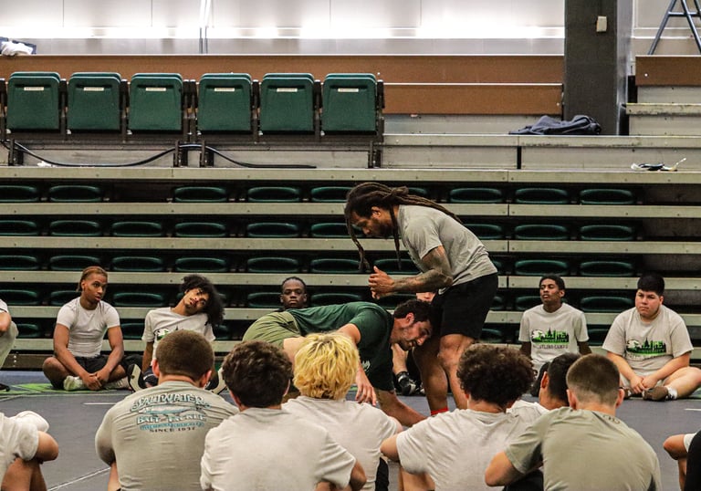 Coach demonstrating technique