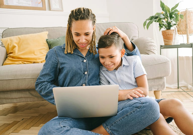 Mother and son sitting on the floor at home exploring 10-year fixed vs variable mortgage options