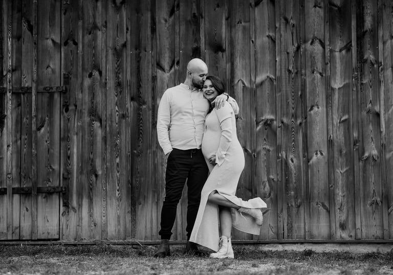 a man and woman standing next to each other
