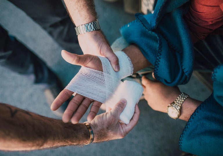 a man is holding a bandage in his hand