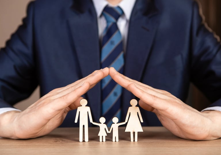 a man in a suit and tie holding hands in front of a family
