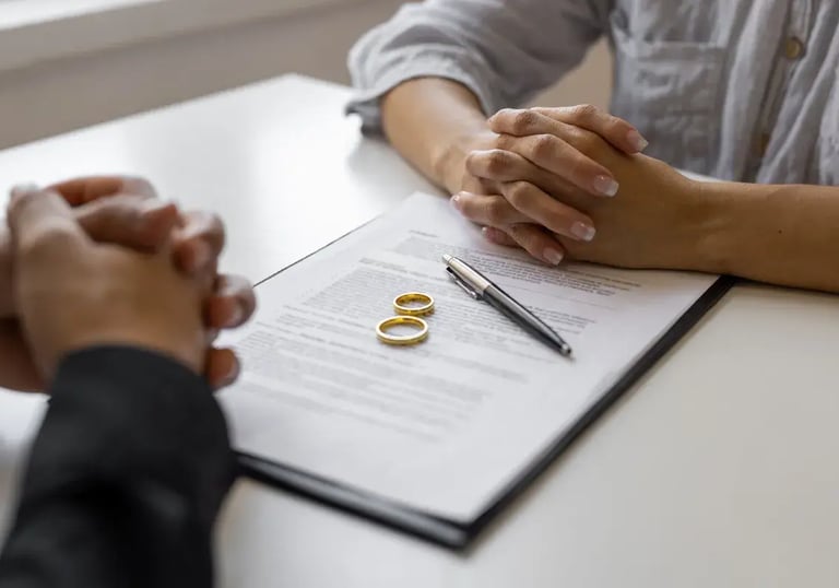 a man and woman holding hands over a paper