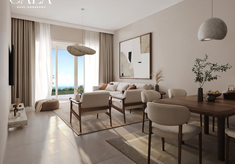 a living room with a couch and a table at cala sahl hasheesh