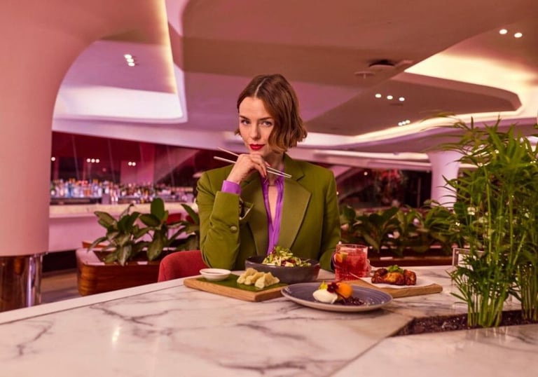 Woman eating sushi at marble bar in Virgin Atlantic Clubhouse London Heathrow - Airport Lounge guide