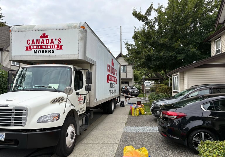 Canada’s Most Wanted Movers truck loading for a townhouse move in the Maple Ridge