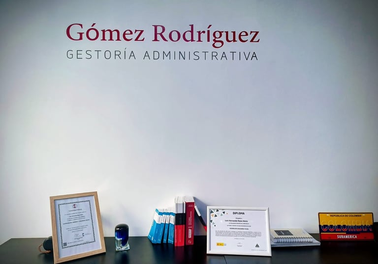 a desk with a laptop and a laptop on it