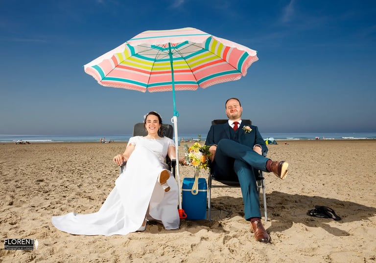 florent photographe lille le touquet saint omer a man and woman wedding sitting on a beach