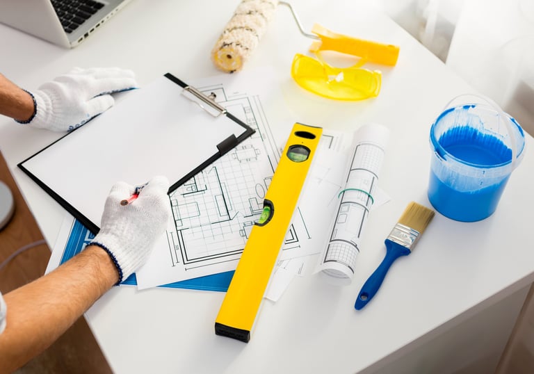 a man is working on a project on a desk