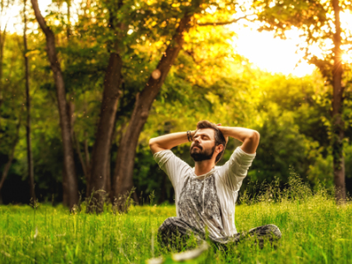 Man practicing mindfulness meditation and enjoying the present moment.. 