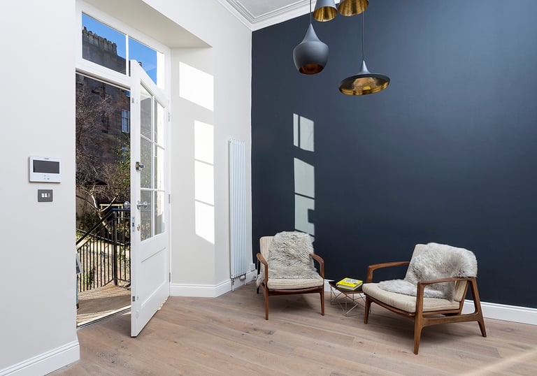 a room with a chair and a chair in it