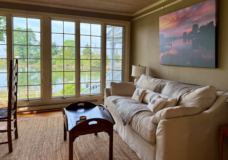 The Sunroom with breathtaking views of the tidal Hammock River. A birder's paradise!