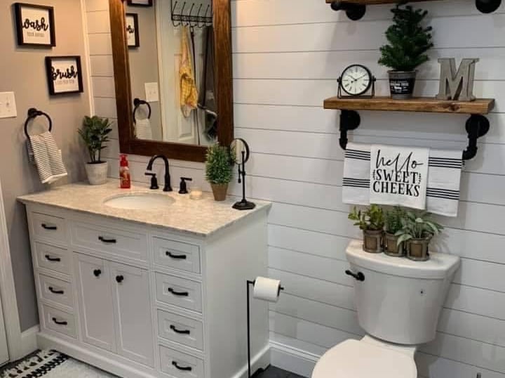 a bathroom with a toilet and a sink