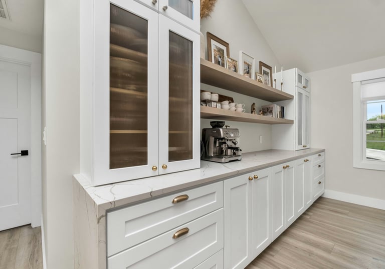 "Modern kitchen remodel in Bradenton, FL with white shaker cabinets and quartz countertops"
