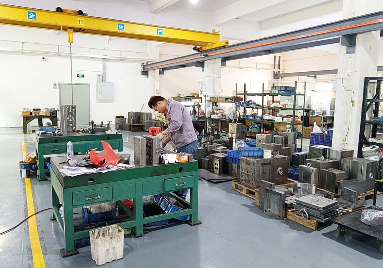 mould maker in metal mold workshop
