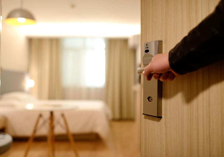 door opening to hotel room