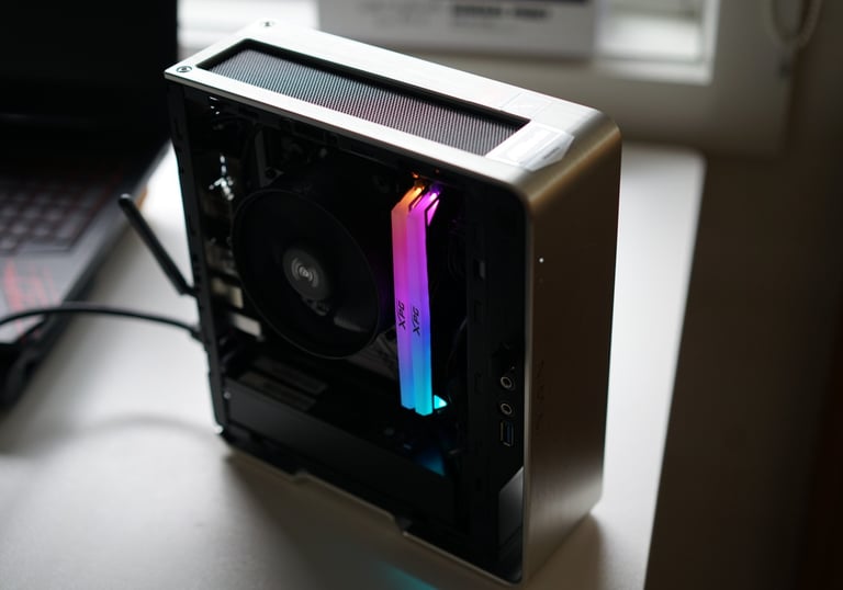 a computer case with a colorful rainbow - colored light