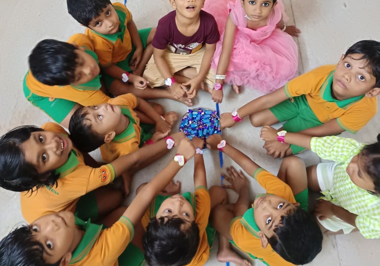 Joyful preschoolers in colorful outfits gathered around a pile of treats, celebrating friendship and