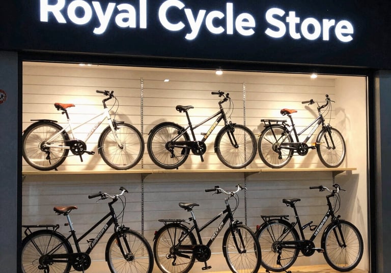 A joyful customer test riding a Mach City cycle on a sunny day near Krishnagiri.