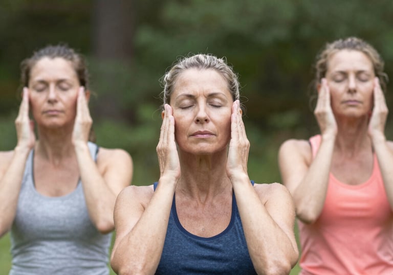 woman covering her face with her hand