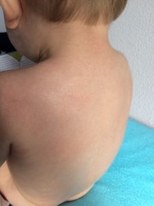 a baby boy with a toothbrush and a toothbrush