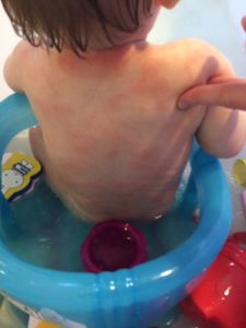 a baby in a tub with a baby in a tub