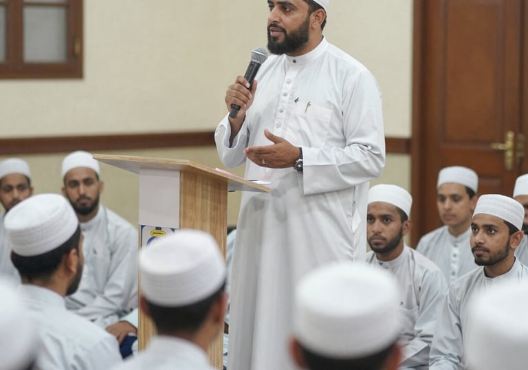 A teacher gently guiding a young student through Islamic character lessons.