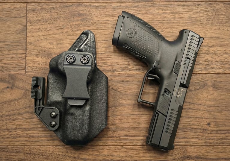 Black CZ P-10 C semi-automatic pistol next to a custom Kydex IWB holster on a wood background.