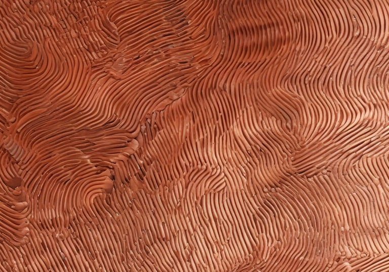 Artisan polishing a copper water filter, highlighting its smooth, warm finish.