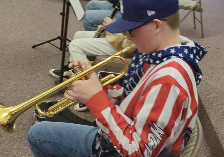 Tacoma Area Homeschool Band students playing in class 