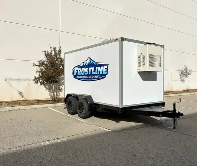 Frostline mobile refrigeration rental trailer parked in a lot for cold storage solutions.