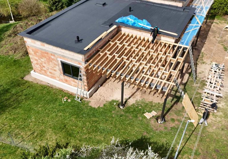 a house being built into a roof with a roof that is being built into a