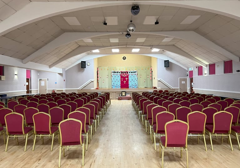 A picture of a hall fully setup for the music event