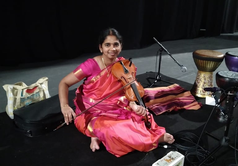 A picture of Srividya Venkat in an auditorium