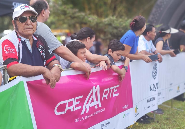 a man in a cap and sunglasses is looking at a sign that says crea