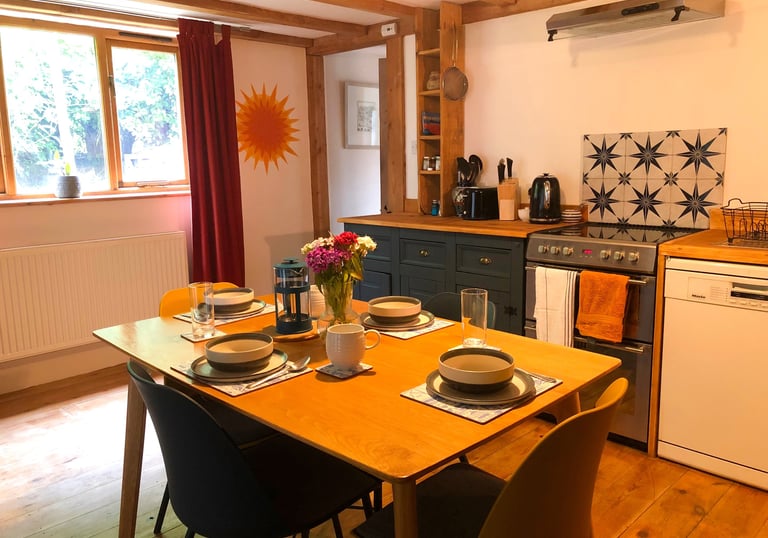 holiday rental interior showing breakfast table in the kitchen