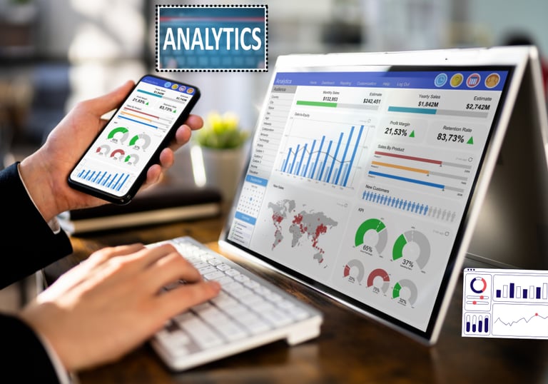 a person holding a cell phone and a laptop with data analytics displaying on both screens
