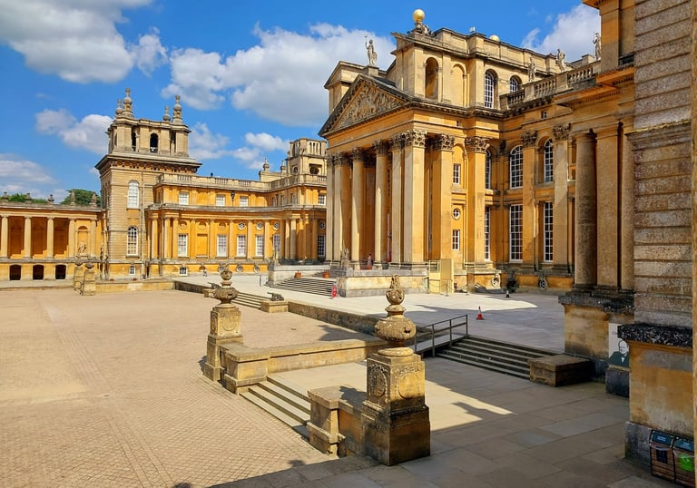 Blenheim Palace buildingBlenheim Palace exterior on a sunny day, viewed from the formal gardens