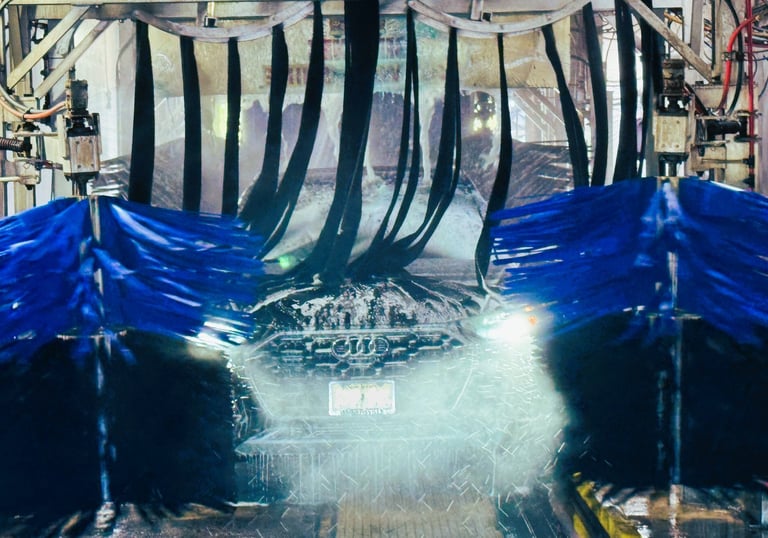 Car exiting ride-thru tunnel