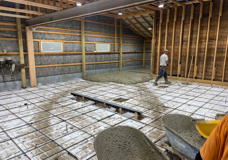 Machine shop floor 6 inches of concrete with rebar and a floor drain.