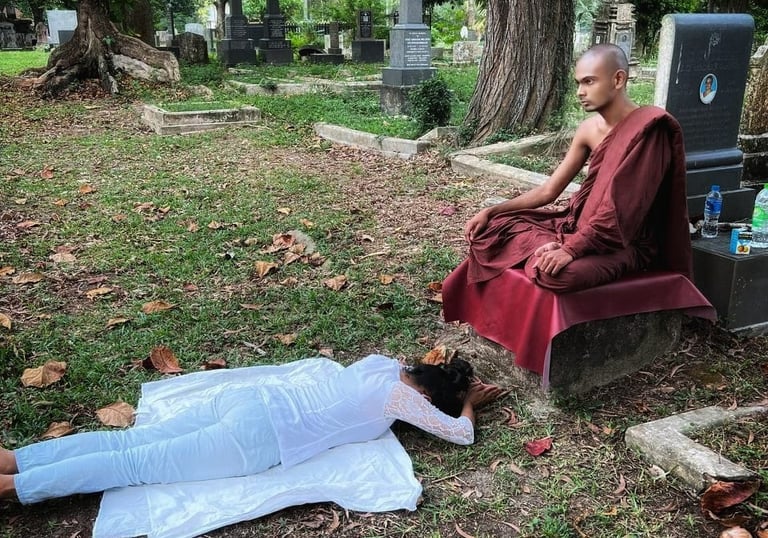 a monk monk in a cemetery cemetery in a cemetery