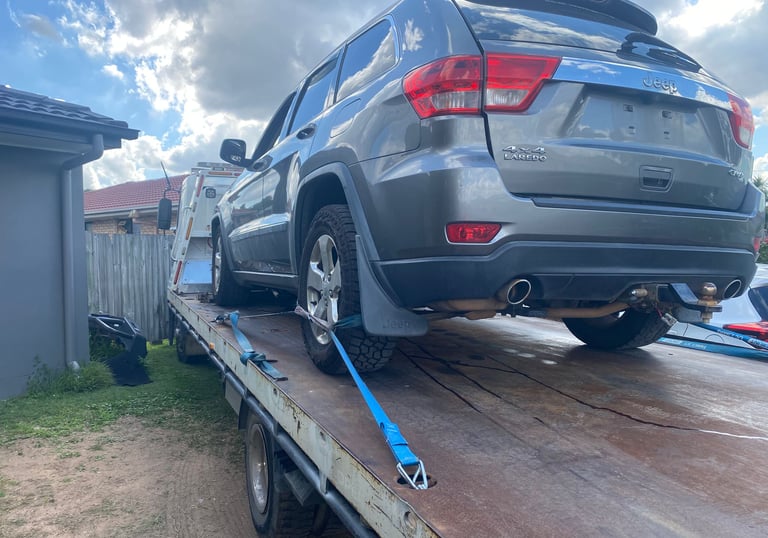 Customer receiving instant cash for their old car in Brisbane